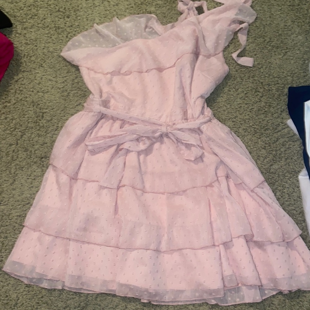 One shoulder pink dress with a belt that ties in the front